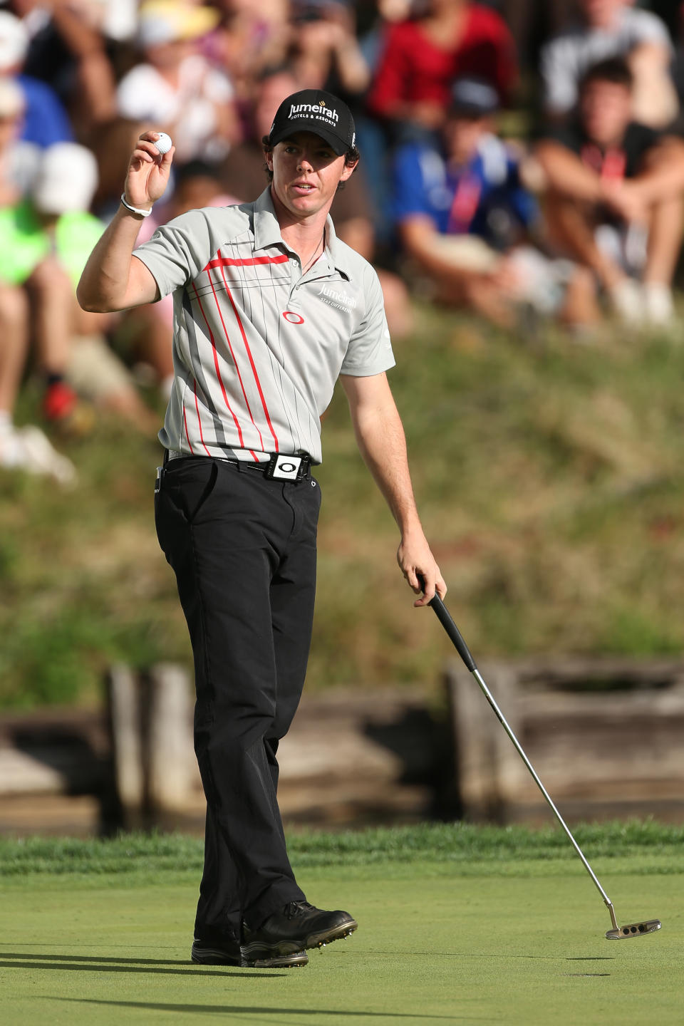 CARMEL, IN - SEPTEMBER 09: Rory McIlroy of Northern Ireland reacts after he made his final putt on the 18th green to finish 2o under and win the tournament during the final round of the BMW Championship at Crooked Stick Golf Club on September 9, 2012 in Carmel, Indiana. (Photo by Warren Little/Getty Images)