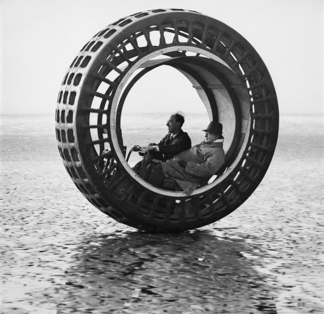 <span>Inventor JA Purves takes a friend for a whirl in his Dynasphere, 1930.</span><span>Photograph: Fox Photos/Getty Images</span>