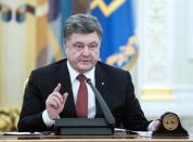 Ukrainian President Petro Poroshenko cautioned that the withdrawal of pro-Kiev forces from the frontline was "just a first, test step"