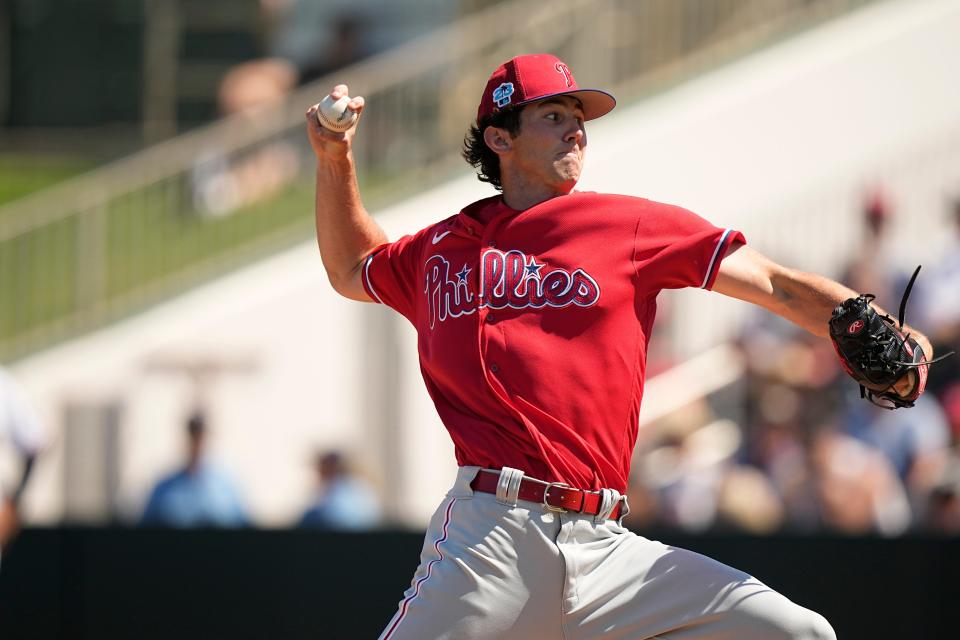 Philadelphia Phillies' pitcher Andrew Painter, delivers in the first inning during a spring training baseball game against the Minnesota Twins, Wednesday, March 1, 2023, in Fort Myers, Fla.