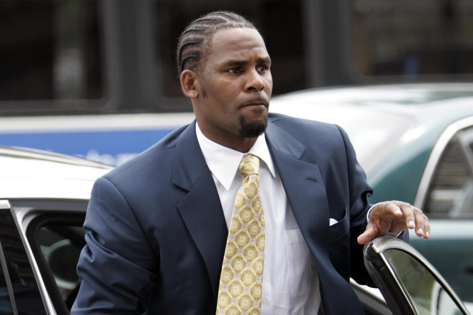 FILE - R. Kelly arrives at the Cook County Criminal Court Building, in Chicago, June 13, 2008. For many people old enough to remember O.J. Simpson's murder trial, his 1994 exoneration was a defining moment in their understanding of race, policing and justice. Nearly three decades later, it still reflects the different realities of white and Black Americans. Simpson, who died Wednesday, April 10, 2024, remains a symbol of racial divisions in American society because he is a reminder of how deeply inequities are felt, even as newer figures have come to symbolize the struggles around racism, policing and justice. (AP Photo/Nam Y. Huh, File)