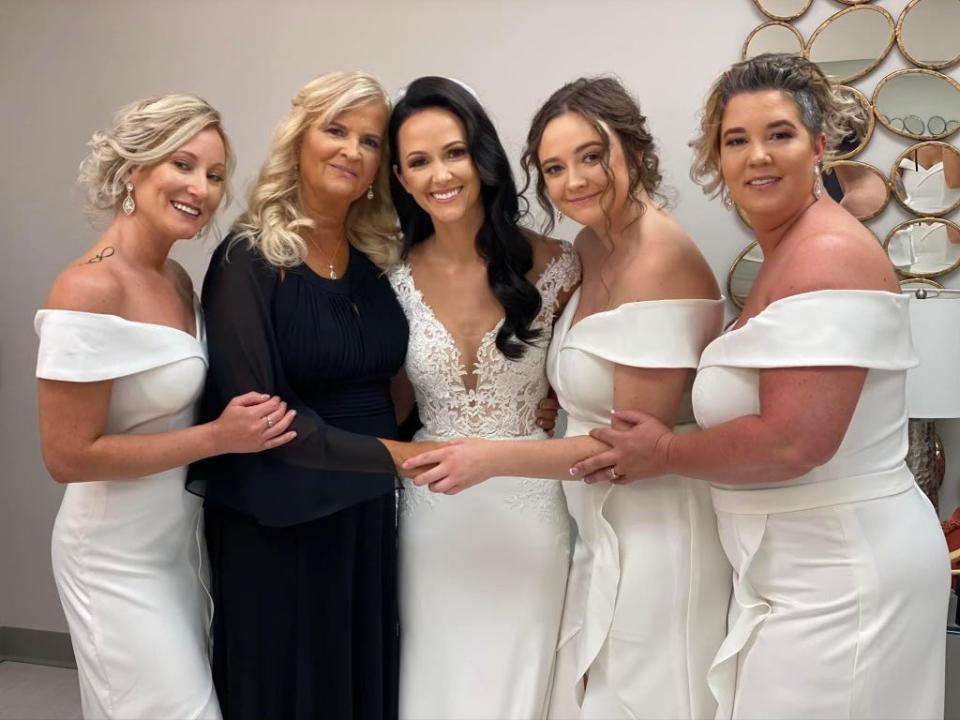 (From left to right) Keisha Jensen, Terri Jensen, Kyndra smith, Kiana Jensen and Kacy Munden are pictured at Smith's wedding in August 2020 in Omaha, Nebraska.