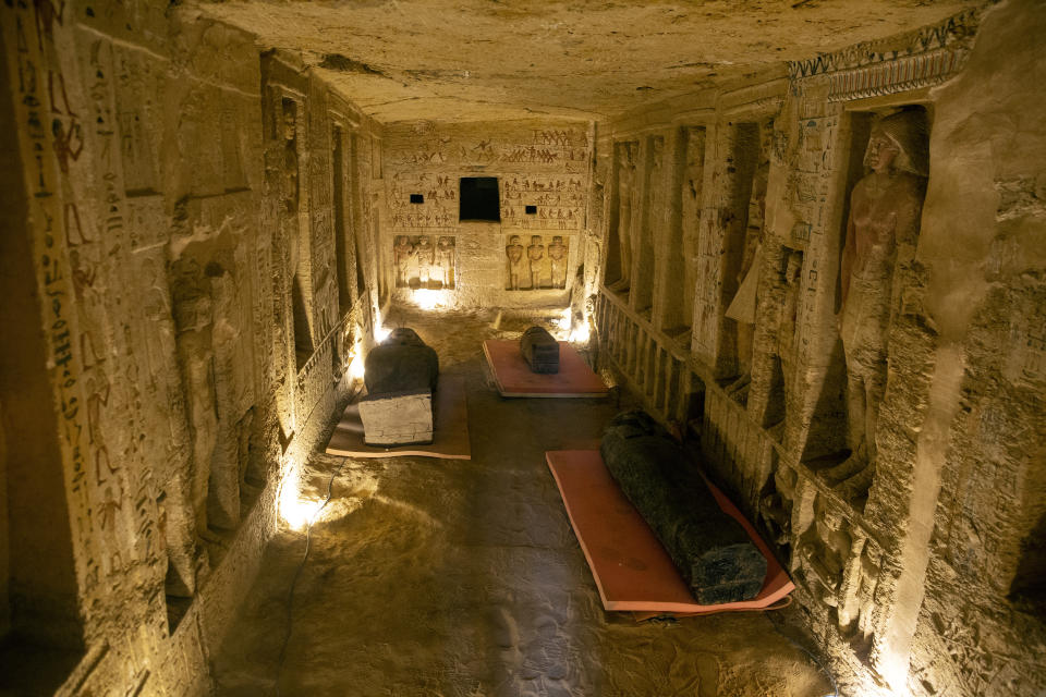 A sarcophagus that is around 2500 years old at the Saqqara archaeological site is shwon, 30 kilometers (19 miles) south of Cairo, Egypt, Saturday, Oct. 3, 2020. Egypt says archaeologists have unearthed about 60 ancient coffins in a vast necropolis south of Cairo. The Egyptian Tourism and Antiquities Minister says at least 59 sealed sarcophagi with mummies inside were found that had been buried in three wells more than 2,600 years ago. (AP Photo/Mahmoud Khaled)