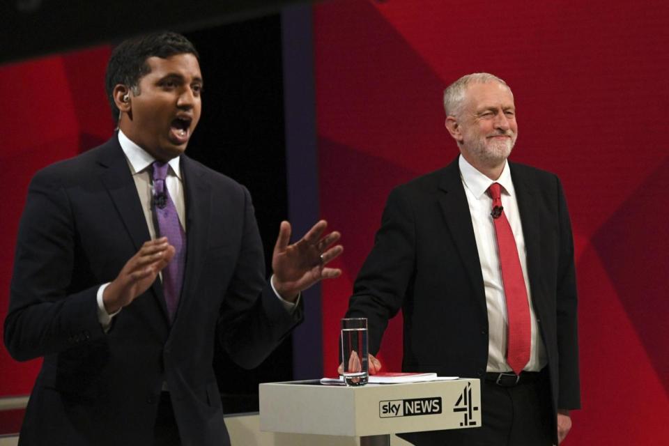 Labour leader Jeremy Corbyn, right, walks on stage as he is introduced by Sky News political editor Faisal Islam (Sky News)