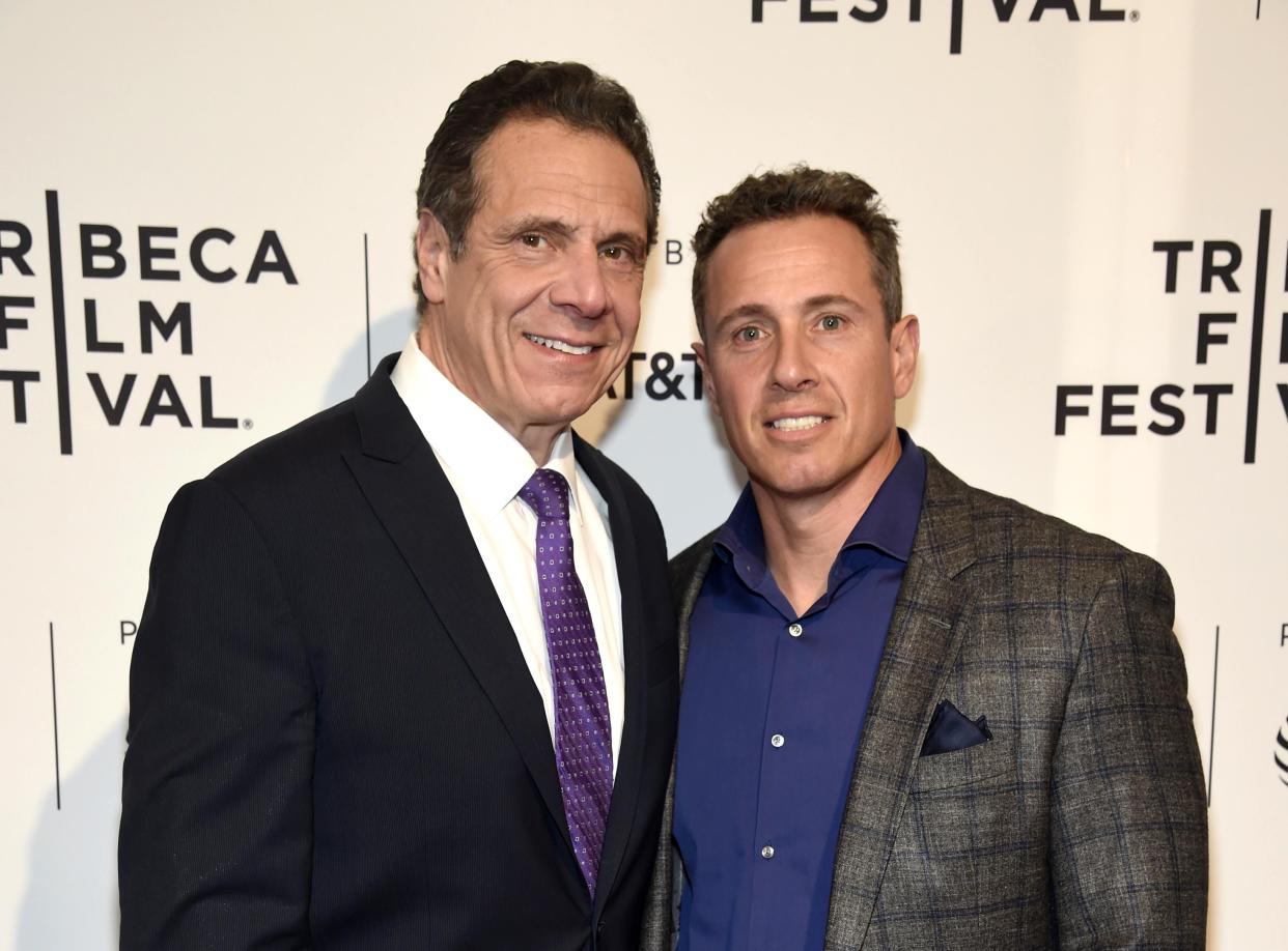 Then-New York Governor Andrew Cuomo (left) and his brother, Chris Cuomo (right)