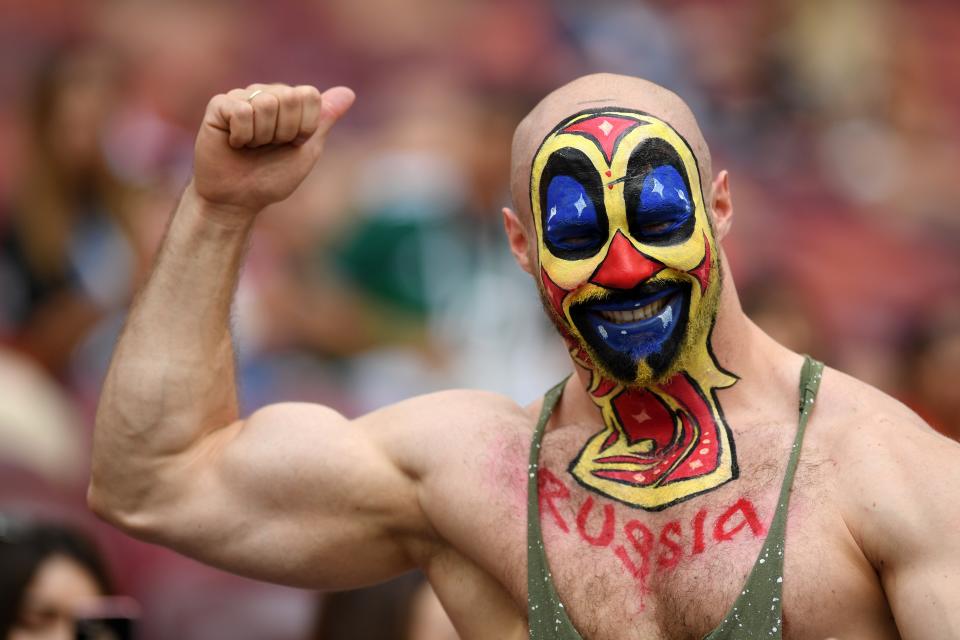 <p>World Cup on his mind – or at least painted on his head: A fan enjoys the pre-match atmosphere. (Photo by Matthias Hangst/Getty Images) </p>