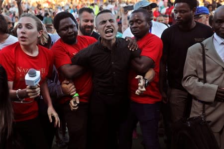 A man reacts during a religious retreat lead by T.B. Joshua, a Nigerian evangelical preacher on Mount Precipice, Nazareth