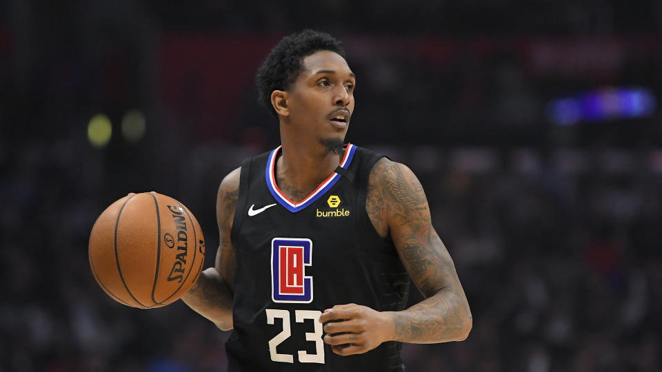 Los Angeles Clippers guard Lou Williams dribbles during the second half of an NBA basketball game against the Denver Nuggets Friday, Feb. 28, 2020, in Los Angeles. The Clippers won 132-103. (AP Photo/Mark J. Terrill)