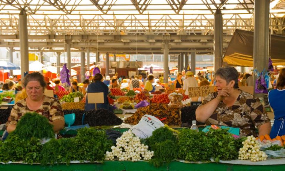 Female vendors at Piata Centrala marketplace in Chisinau, Moldova, Europe.