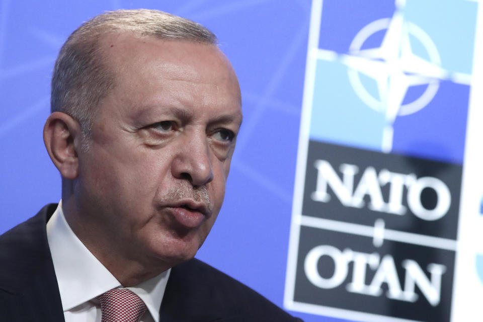 Turkey's President Recep Tayyip Erdogan speaks during a media conference at a NATO summit in Brussels, Monday, June 14, 2021. U.S. President Joe Biden is taking part in his first NATO summit, where the 30-nation alliance hopes to reaffirm its unity and discuss increasingly tense relations with China and Russia, as the organization pulls its troops out after 18 years in Afghanistan. (Yves Herman, Pool via AP)