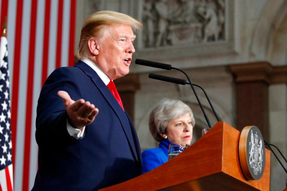 President Donald Trump speaks during a news conference with British Prime Minister Theresa May at the Foreign Office, Tuesday, June 4, 2019, in central London.