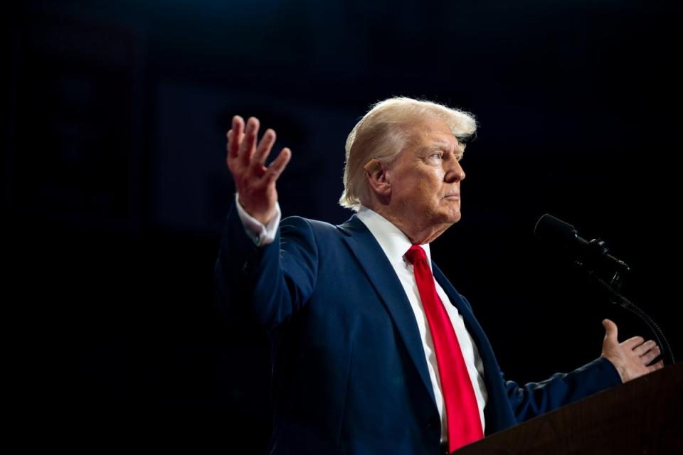 U.S. Republican Presidential nominee former President Donald Trump arrives at his campaign rally at the Bojangles Coliseum on July 24, 2024 in Charlotte, North Carolina. He has suggested that burning the U.S. flag should result in one year in prison (Getty Images)