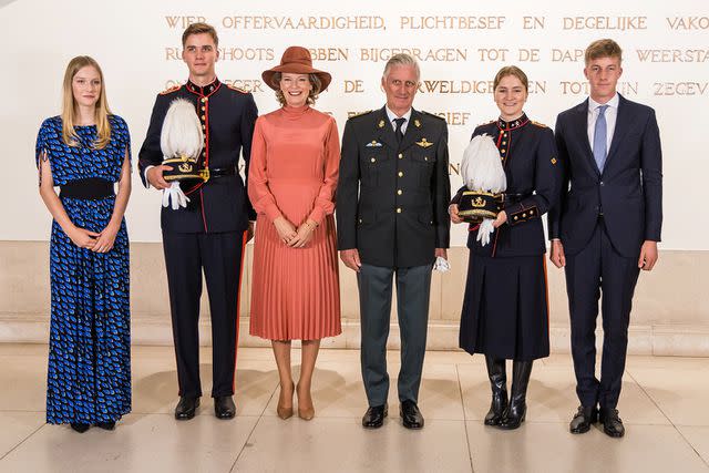 <p>Geert Vanden Wijngaert/Getty</p> The Belgian royal family at Princess Elisabeth’s swearing-in ceremony at the Royal Military Academy on September 26.