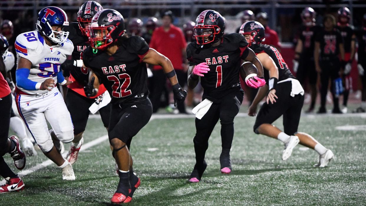 Cherry Hill East's Isaiah Donaldson runs the ball during the football game between Cherry Hil East and Triton played at Cherry Hill East High School on Friday, September 13, 2024. Cherry Hill East defeated Triton, 31-7, and East improved to 3-0.