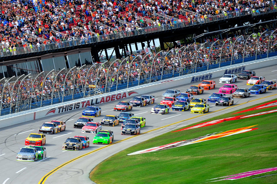 TALLADEGA, AL - OCTOBER 23: Jimmie Johnson, driver of the #48 MyLowe's Chevrolet, leads the field during the NASCAR Sprint Cup Series Good Sam Club 500 at Talladega Superspeedway on October 23, 2011 in Talladega, Alabama. (Photo by Jason Smith/Getty Images)