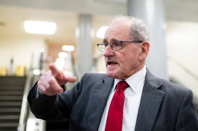 Sen. Jim Risch (R-Idaho) speaks with reporters in the Senate subway after a vote in the Capitol on Feb. 9, 2022. 