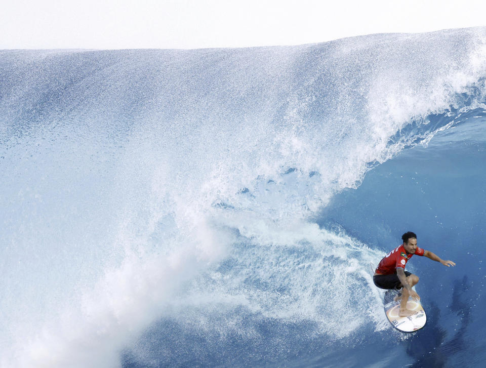 Surfer Italo Ferreira of Brazil competes on his way to winning the latest competition of the World Surf League Championship Tour in Teahupoʻo in Tahiti on May 30, 2024. (Kyodo News via AP)