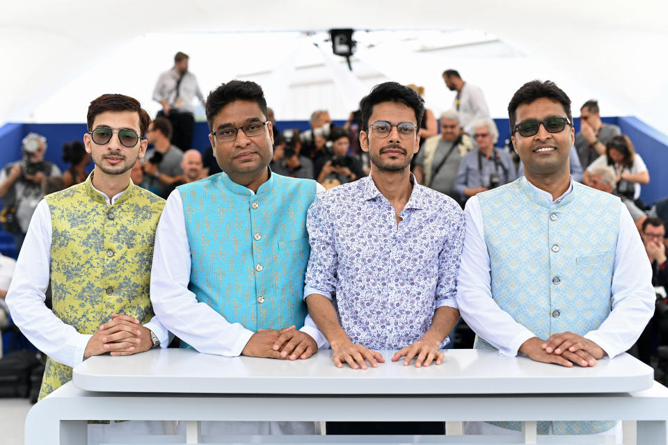 (L to R) Salik Rehman, Nadeem Shehzad, director Shaunak Sen, and Mohammad Saud attend the photocall for "All That Breathes" during the 75th annual Cannes film festival on May 23, 2022 in Cannes, France.