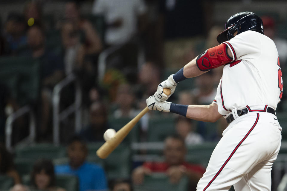 Atlanta Braves Austin Riley hits a tip foul in the eighth inning of a baseball game against the San Francisco Giants Wednesday, June 22, 2022, in Atlanta. (AP Photo/Hakim Wright Sr.)