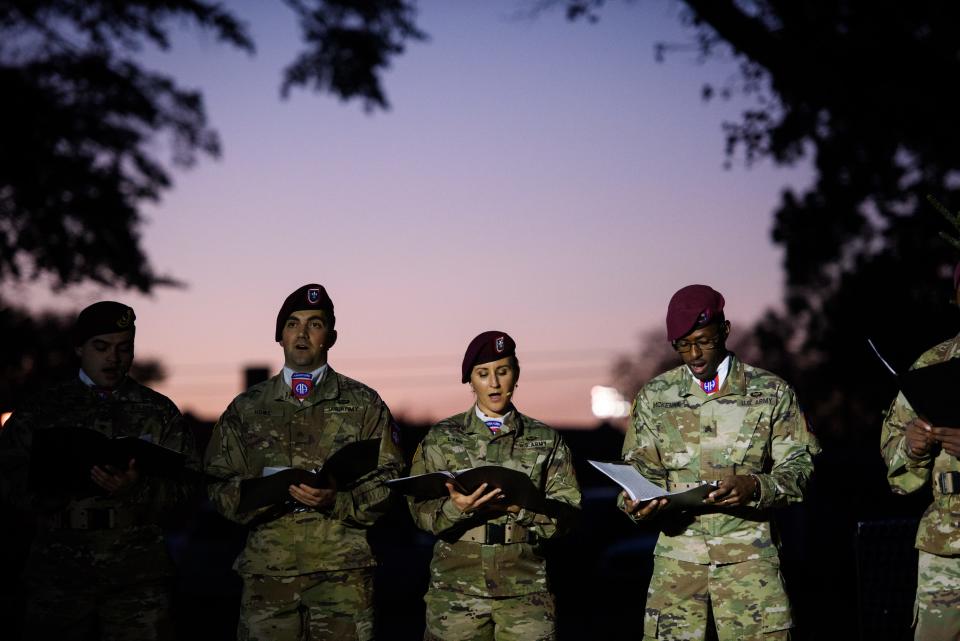 Members of the 82nd Airborne Division All-American Chorus sing Christmas carols at the Fort Bragg Family of the Year and Tree Lighting ceremony on Friday, Dec. 3, 2021.