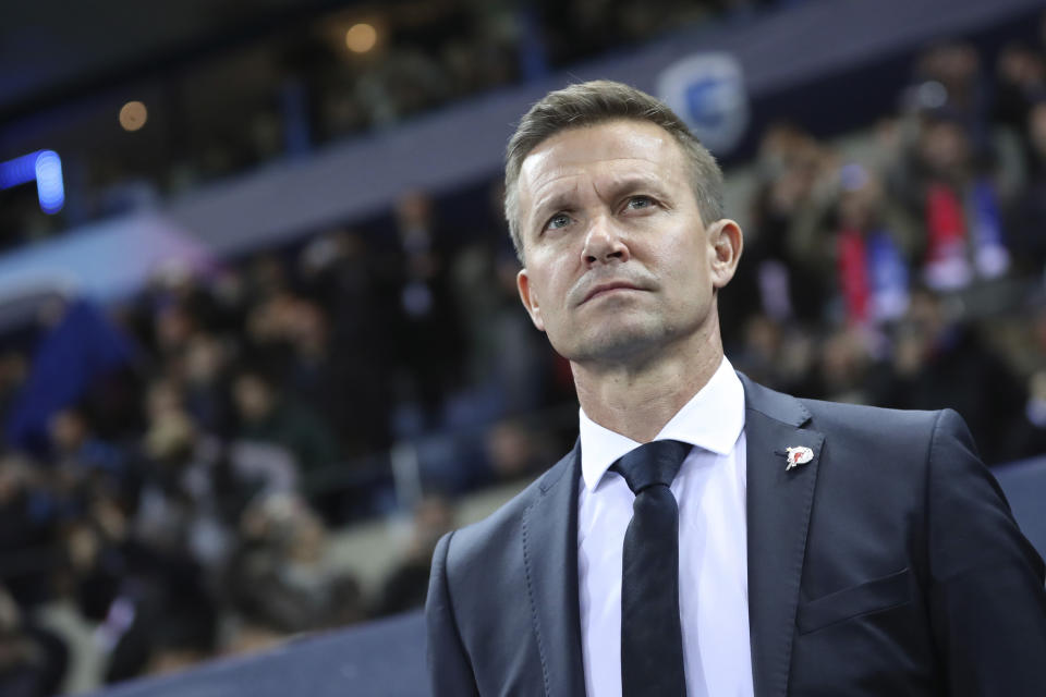 FILE - In this file photo dated Wednesday, Nov. 27, 2019, Salzburg soccer coach Jesse Marsch stands on the sidelines during a Champions League group E soccer match against Genk at the KRC Genk Arena in Genk, Belgium. Marsch led Salzburg to this season’s Austrian league title, the most significant trophy won by an American coach in Europe, and says he wanted "to see if my idea of leadership could thrive in this competitive setting,” the Wisconsin native told The Associated Press Friday July 3, 2020. (AP Photo/Francisco Seco, FILE)