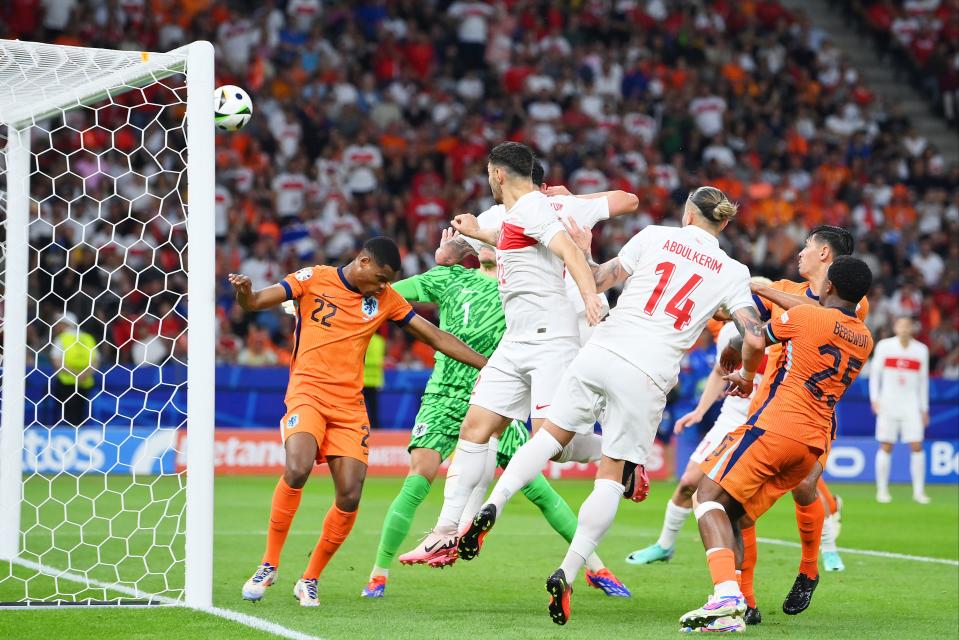 Samet Akaydin heads home to open the scoring for Turkey (Getty Images)