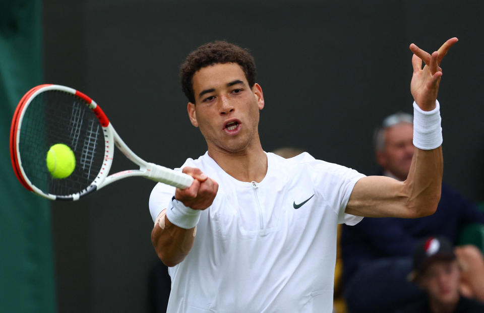 George Loffhagen in action during his first round match against Holger Rune at Wimbledon last year (REUTERS/Toby Melville via Beat Media Group subscription)