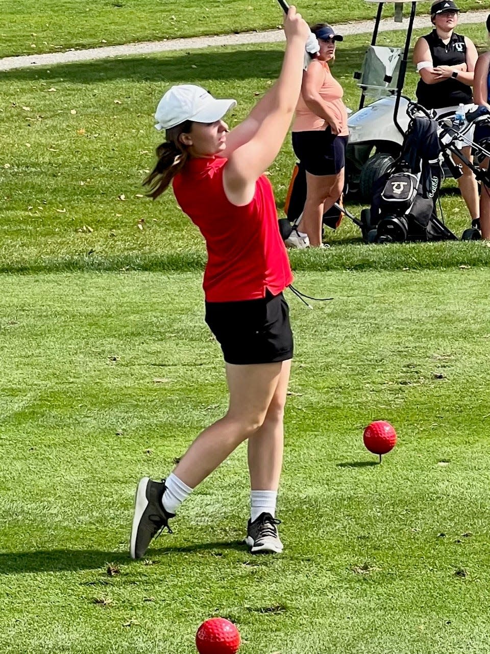 Pleasant's Maddie Murphy tees off during the Mid Ohio Athletic Conference Girls Golf Tournament at the Country Club of Bucyrus last week.