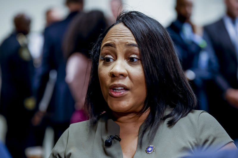 Fulton County District Attorney Fani Willis, who led the grand jury investigation into former President Donald Trump's alleged attempts to overturn the results of the 2020 election in Georgia, is giving the defendants until noon August 25 to voluntarily surrender. File Photo by Erik S. Lesser/EPA-EFE