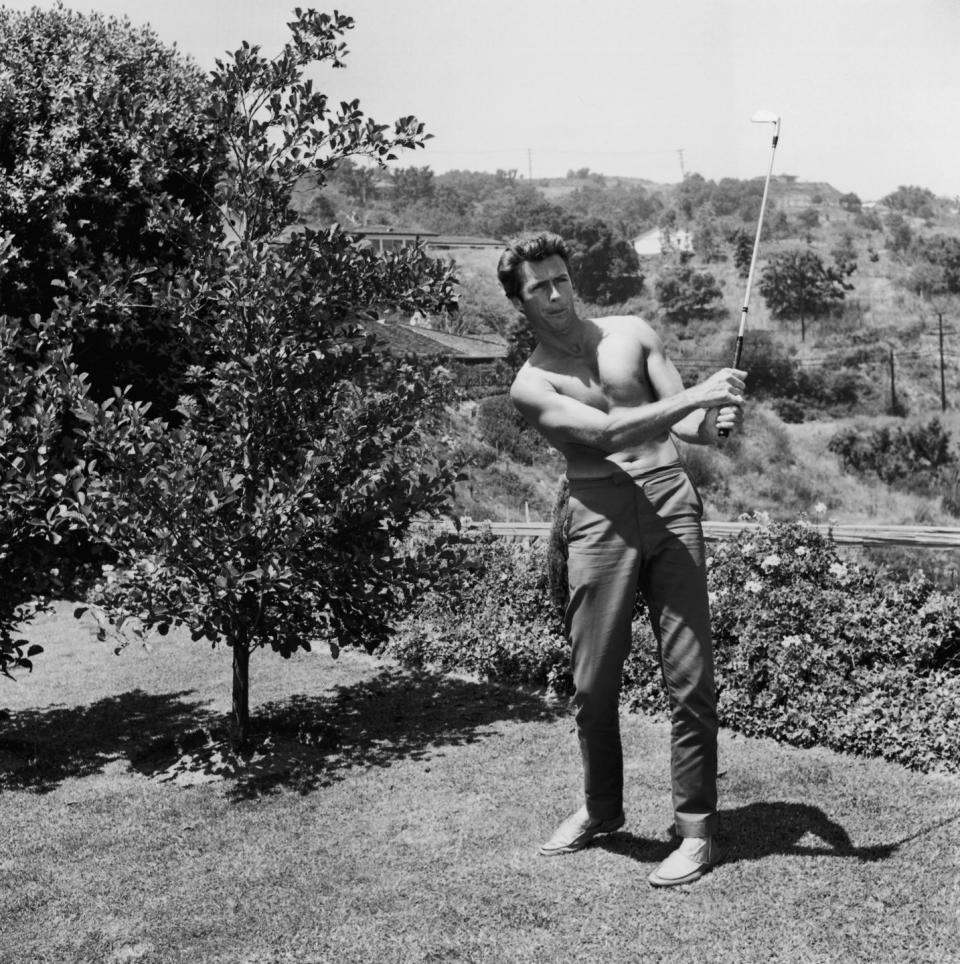 <p>Clint Eastwood practices his golf swing, circa 1968.</p>