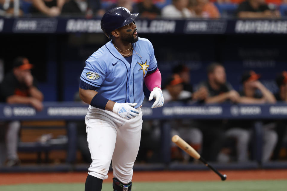 Tampa Bay Rays' Yandy Diaz watches his two-run home run against the Baltimore Orioles during the fifth inning of a baseball game Sunday, July 23, 2023, in St. Petersburg, Fla. (AP Photo/Scott Audette)