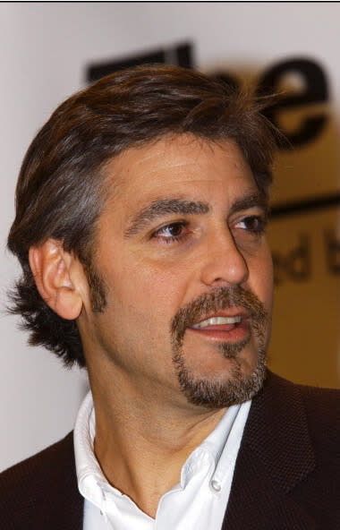 Clooney (and beard) in 2001 at a September 11 charity event.