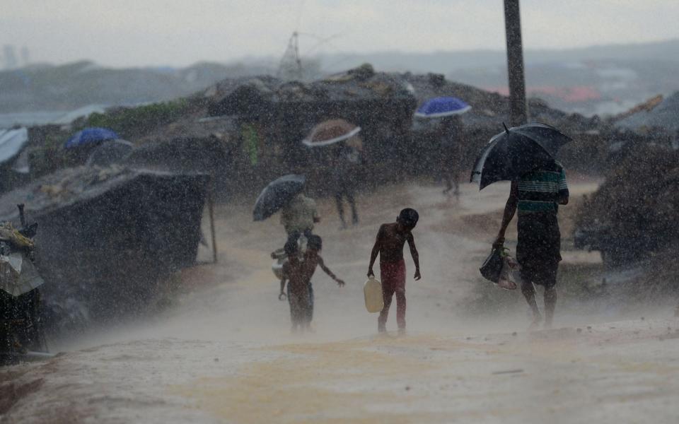 Rohingya refugees in Bangladeshi camps are anxiously awaiting the peak of the monsoon rains - AFP