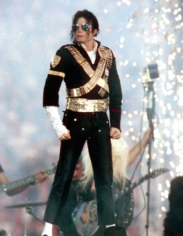 Michael Jackson performs during halftime of a 52-17 Dallas Cowboys win over the Buffalo Bills in Super Bowl XXVII on Jan. 31, 1993, at the Rose Bowl in Pasadena, California. <p>Steve Granitz/Getty Images</p>