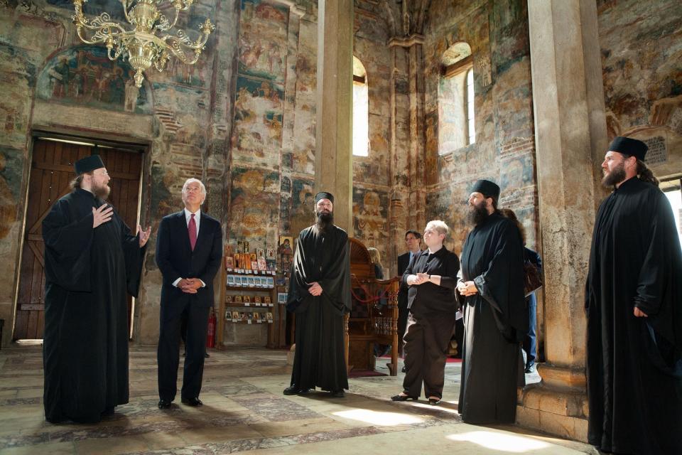 Biden tours the Decani Monastery with Serbian Orthodox Monk Father Sava, left, on May 21, 2009, in Decani, Kosovo.