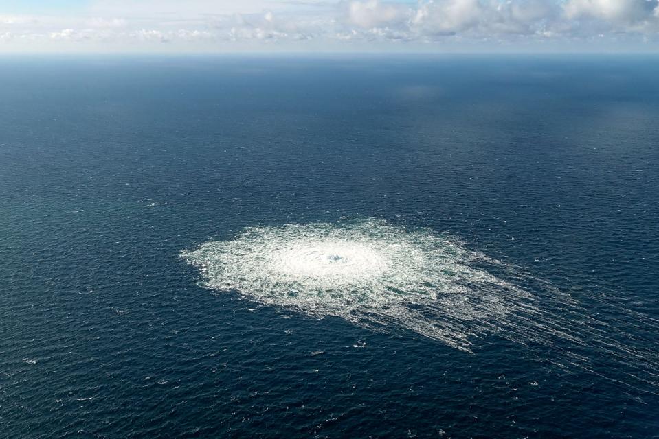 This handout picture released on September 27, 2022 by the Danish Defence Command shows the gas leak at the Nord Stream 2 gas pipeline as it is seen from the Danish Defence's F-16 rejection response off the Danish Baltic island of Bornholm, south of Dueodde. The two Nord Stream gas pipelines linking Russia and Europe have been hit by unexplained leaks, Scandinavian authorities said on September 27, 2022, raising suspicions of sabotage.
