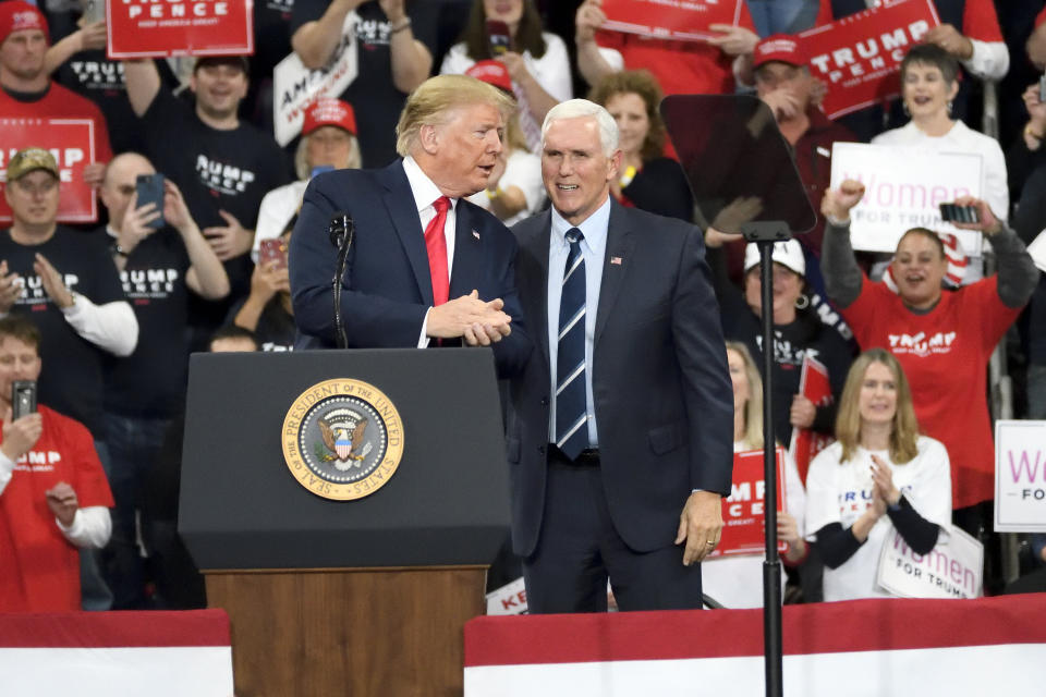 President Donald Trump, who's accused of trying to coerce Ukraine into helping him in the 2020 presidential election, shares the stage with Pence at a rally in Pennsylvania on Tuesday. (Photo: NurPhoto via Getty Images)