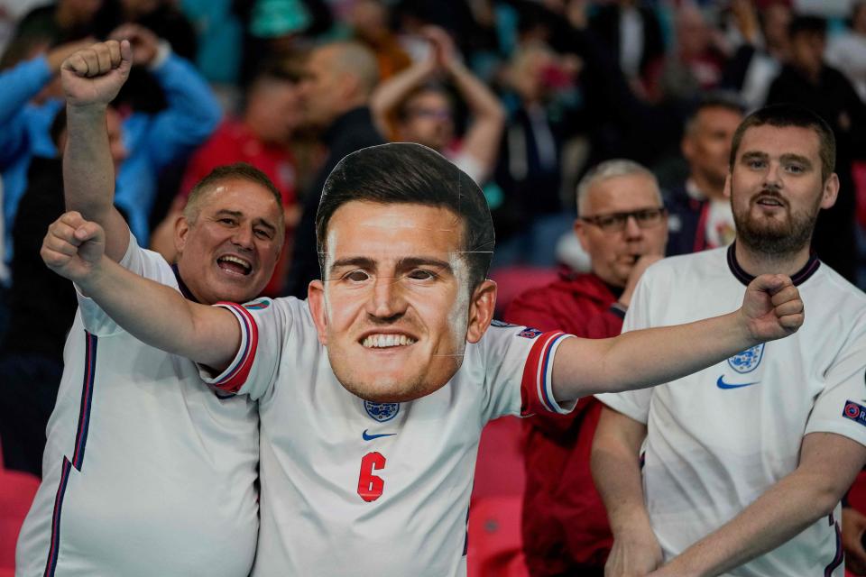 An England supporter wearing a Harry Maguire mask (AFP/Getty)