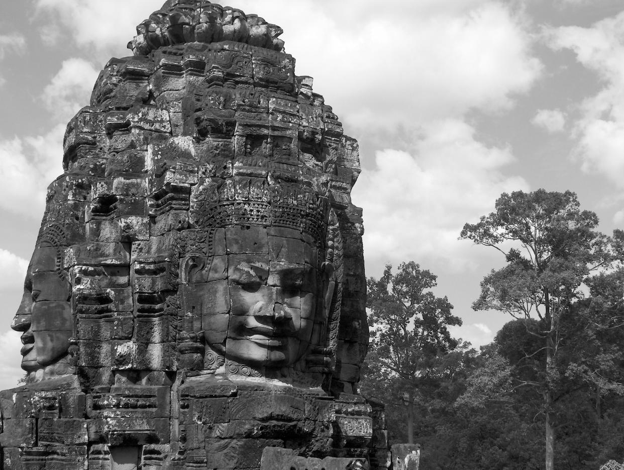 The temple Bayan Thom at Angkor Wat, Cambodia with rain forest in backagroun