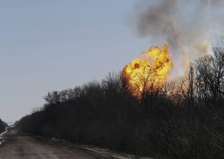 A view of an explosion after shelling is seen not far from Debaltseve February 17, 2015. REUTERS/Gleb Garanich