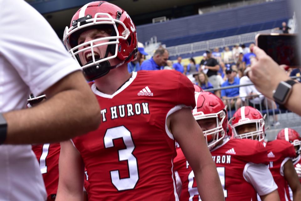 Port Huron's Caden Rogers yells as he walks on the field during a game earlier this season. Rogers recorded 8.5 sacks in 2022.