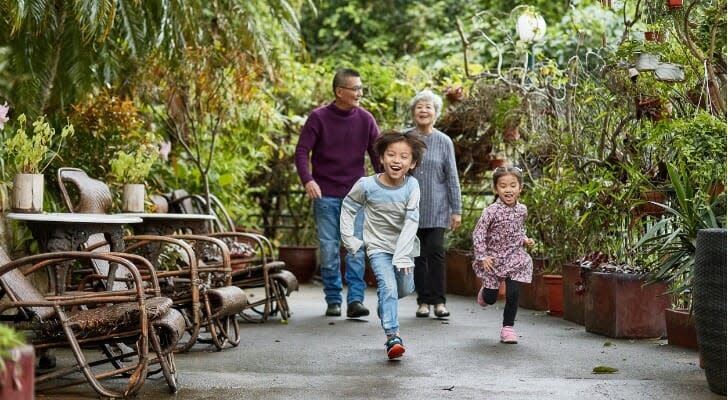 Retirees in China with their grandchildren