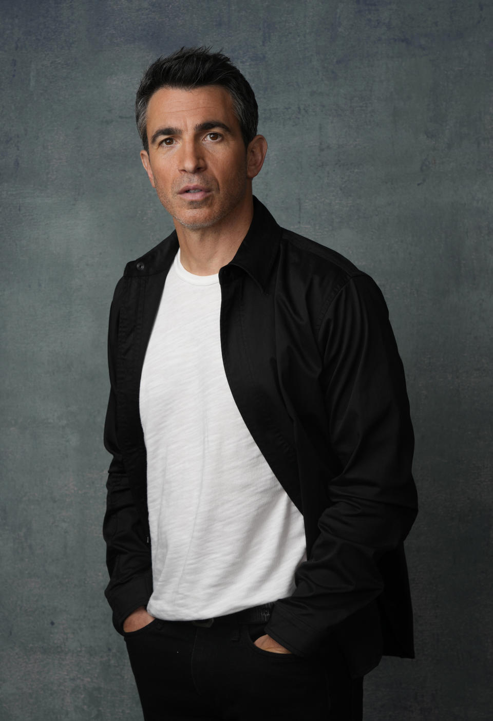 Chris Messina, a cast member in the Peacock series "Based on a True Story," poses for a portrait, Wednesday, May 24, 2023, at the London Hotel in West Hollywood, Calif. (AP Photo/Chris Pizzello)