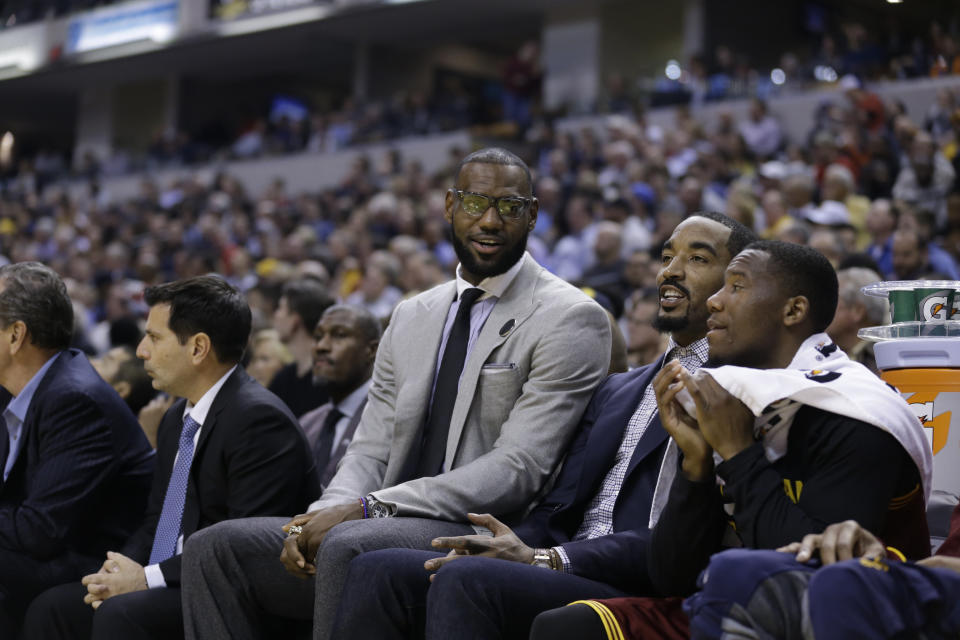 When resting on the road is outlawed, only outlaws like a bespectacled LeBron James will rest on the road. (AP)