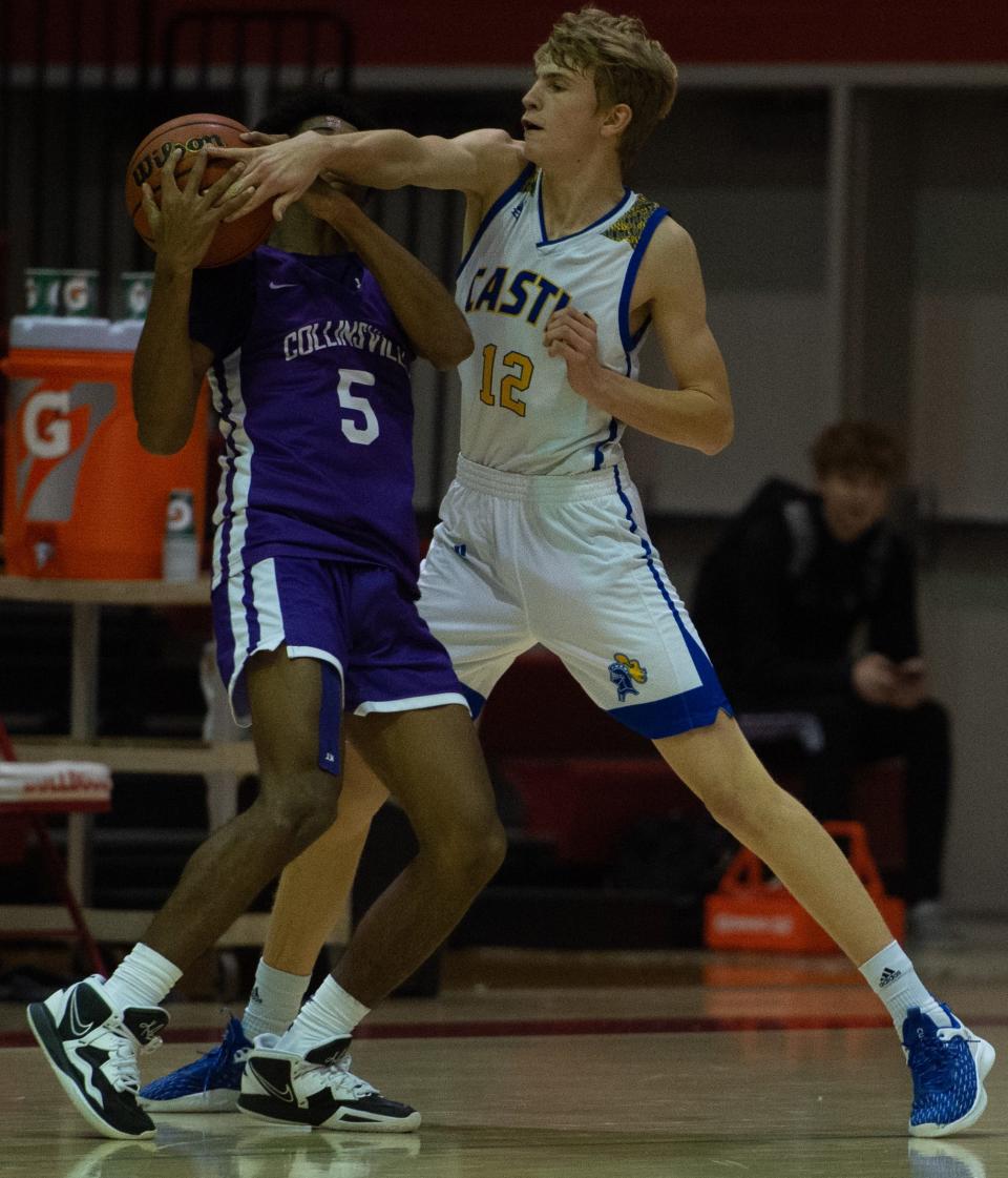 Collinsville’s Jamorie Wysinger (5) is defended by Castle’s Xander Niehaus (12) during the Bosse Winter Classic at Bosse High School in Evansville, Ind., Saturday afternoon, Dec. 17, 2022. 