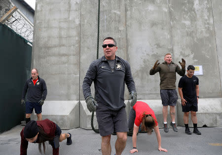 U.S. Army General Scott Miller, Commander of Resolute Support forces and command of NATO forces in Afghanistan, exercises during a New Year celebration at the Resolute Support headquarters in Kabul, Afghanistan January 1, 2019. REUTERS/Mohammad Ismail