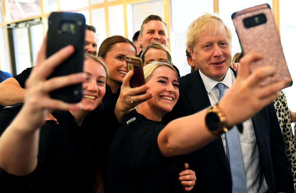 Boris Johnson, a leadership candidate for Britain's Conservative Party, poses for a picture as he visits the Thames Valley Police Training Centre in Reading, Britain, July 3, 2019. REUTERS/Dylan Martinez/Pool