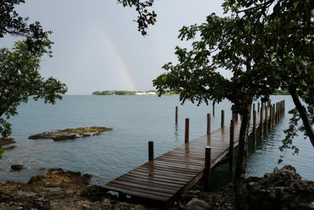 FILE PHOTO: A rainbow appears before the arrival of Hurricane Dorian in Marsh Harbour