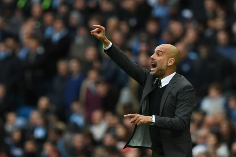 Manchester City's manager Pep Guardiola gives directions from the touchline on October 23, 2016