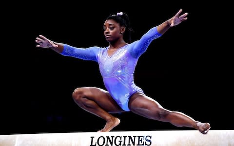 Simone Biles has described the emotional impact of wearing a leotard as a teenager - Credit: Getty Images